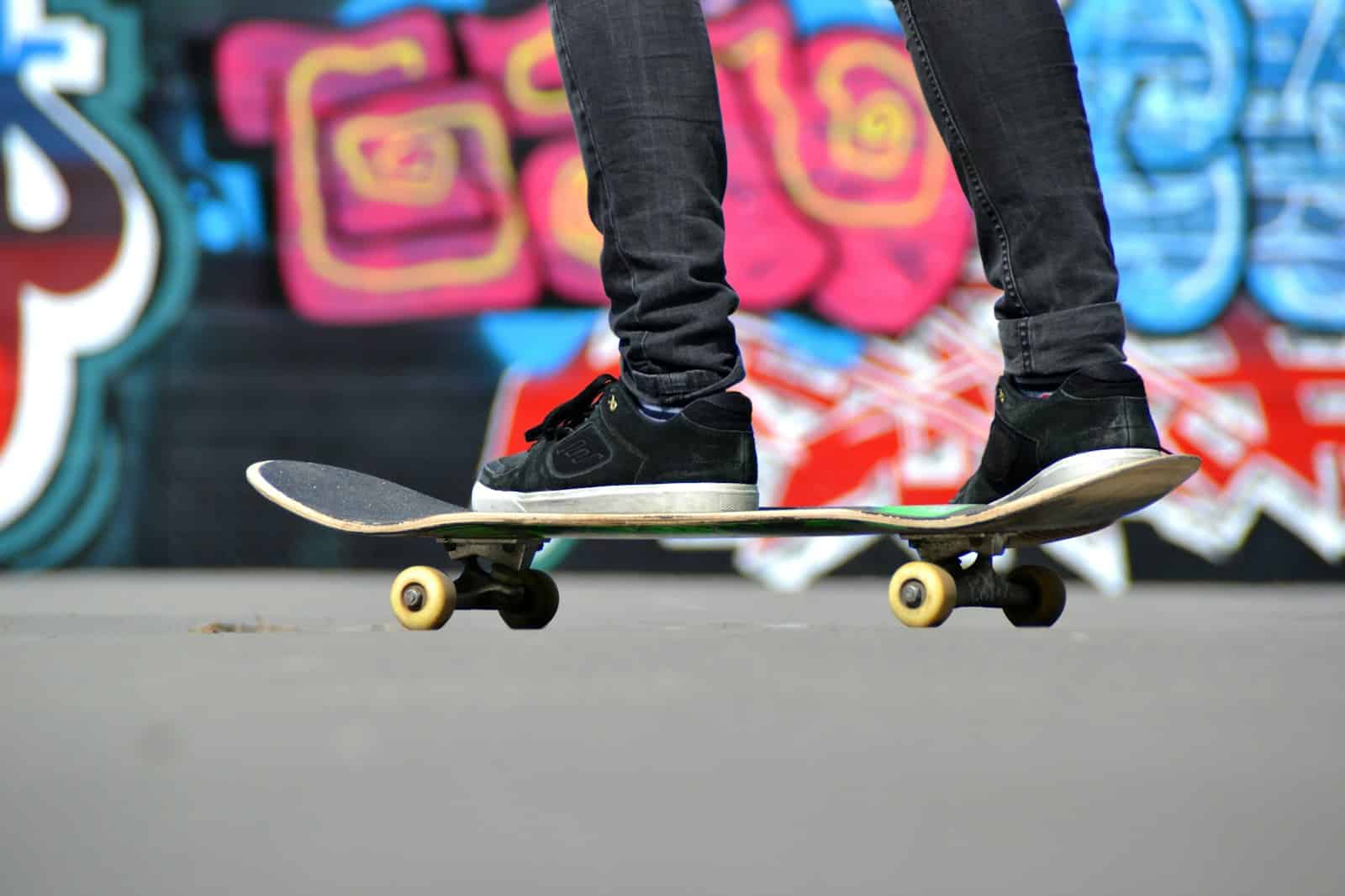 person standing on tic-tac skateboard